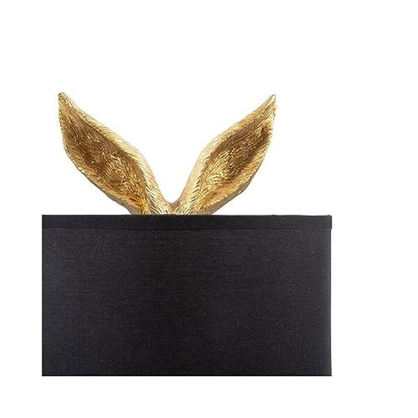 Découvrez notre avis détaillé sur la lampe lapin doré d'Ostaria avec abat-jour noir : design, qualité et performance de ce luminaire tendance. 